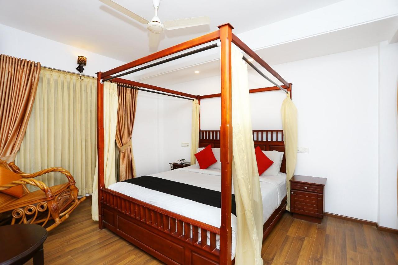 Capital O 37763 Bright Heritage Kochi Esterno foto